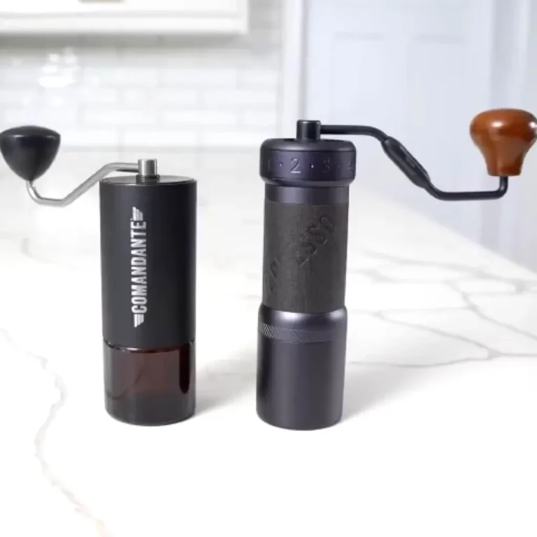 Comandante and 1Zpresso manual coffee grinders side-by-side comparison showing design differences and handle styles