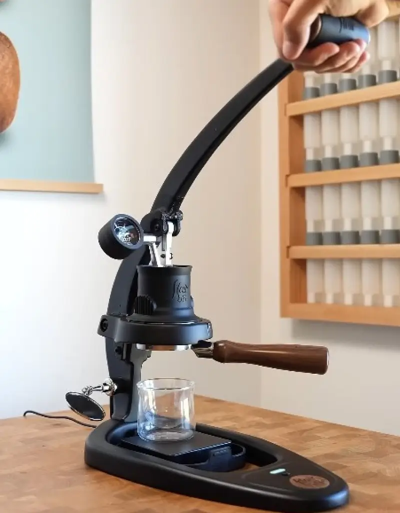 Flair 58 manual espresso machine with lever extraction, professional portafilter and pressure gauge, brewing espresso at home