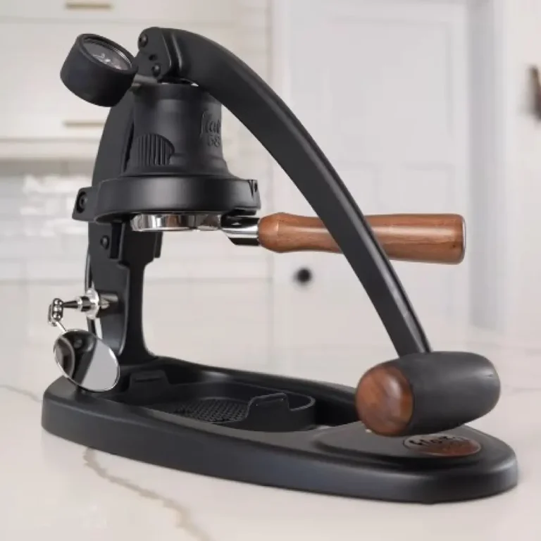 Best manual espresso machine with black frame, wooden handles, pressure gauge, and 58mm portafilter on white countertop