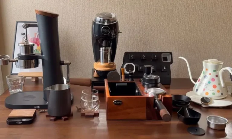 Complete manual espresso machine setup on a walnut countertop featuring the IKAPE Alkaid hand-cranked espresso machine, Niche Duo flat burr grinder, IKAPE V2 knock box organizer station, portafilter, dosing cups, digital scale, double-wall espresso glasses, and Cocinare gooseneck kettle — a full collection of precision espresso tools and accessories for the ultimate home barista workflow.